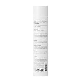 Sun Bum conditioner on a towel at beach illustrating UV-protecting benefit
