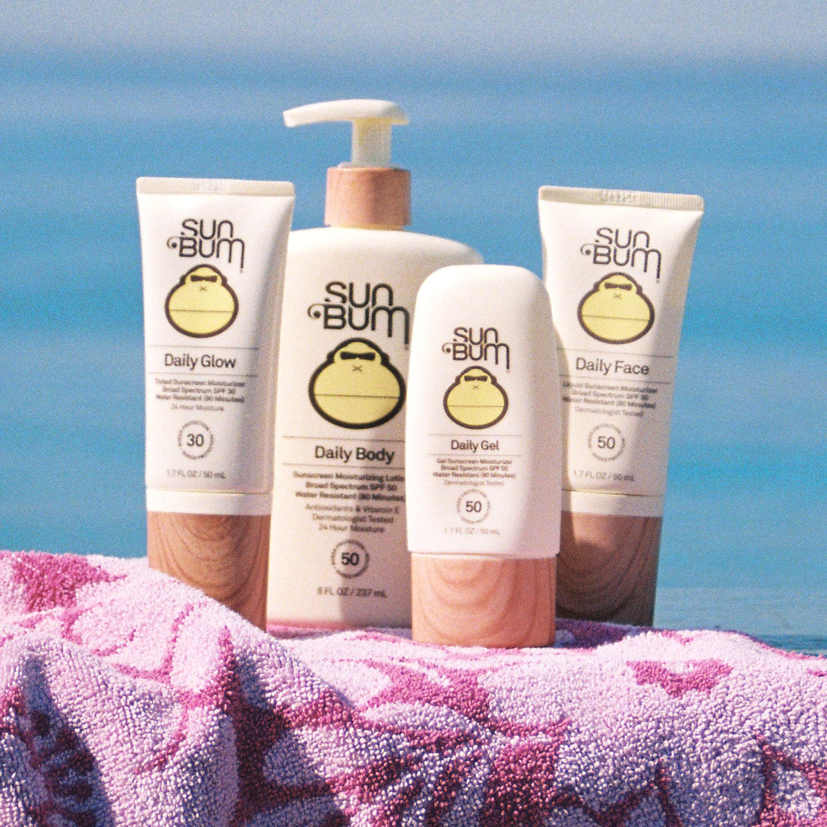 Sun Bum next to passport illustrating 1.7 oz travel convenience