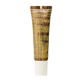 Sun Bum open lip balm with coconut pieces conveying flavor and hydration
