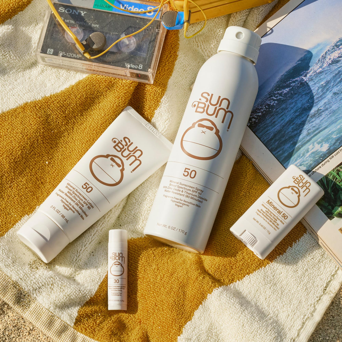 Sun Bum sunscreen spray being applied to arm for quick, water-resistant protection