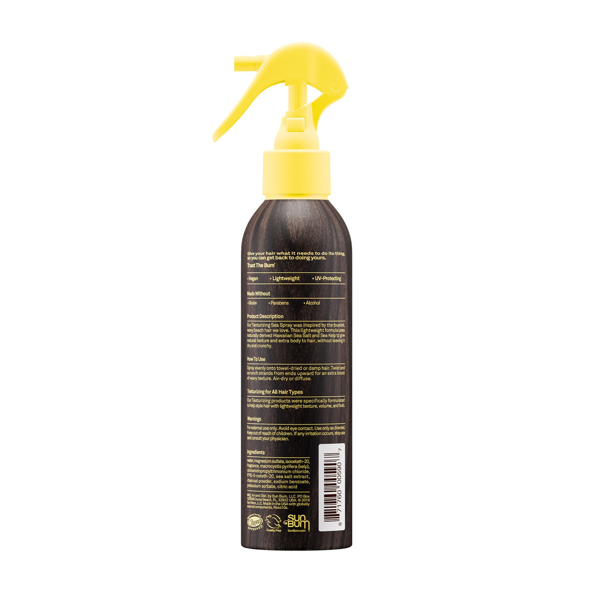 Sun Bum bottle next to everyday items showing travel-friendly size