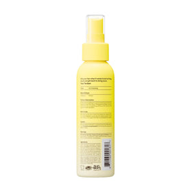 Sun Bum 4 oz bottle in hand showing compact travel-friendly size