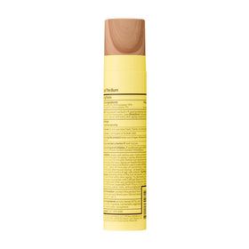 Sun Bum spray application on face showing easy reapplication benefit