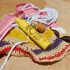 Sun Bum travel size comparison showing TSA-friendly 3.4 oz convenience