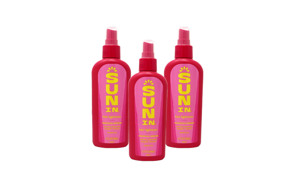 Sun In front packaging showing three bottles and tropical breeze scent for easy brightening