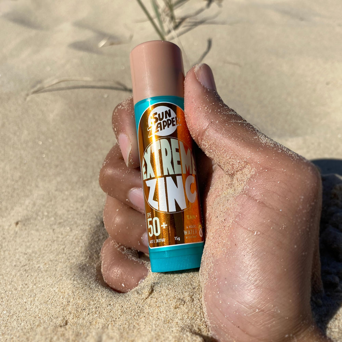 Sun Zapper on face after surfing showing soothing aloe comfort