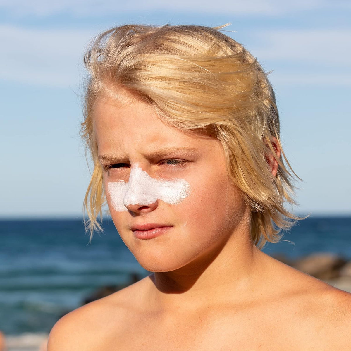 Sun Zapper used on beach showing water-resistant protection during surf