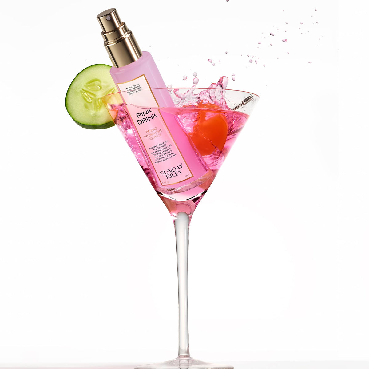Sunday Riley Pink Drink size beside hand showing portable travel-friendly benefit