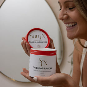 SunFX 4 ounce jar next to hand to show product scale