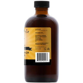 Sunny Isle bottle on bathroom shelf in lifestyle setting to show everyday beauty routine use