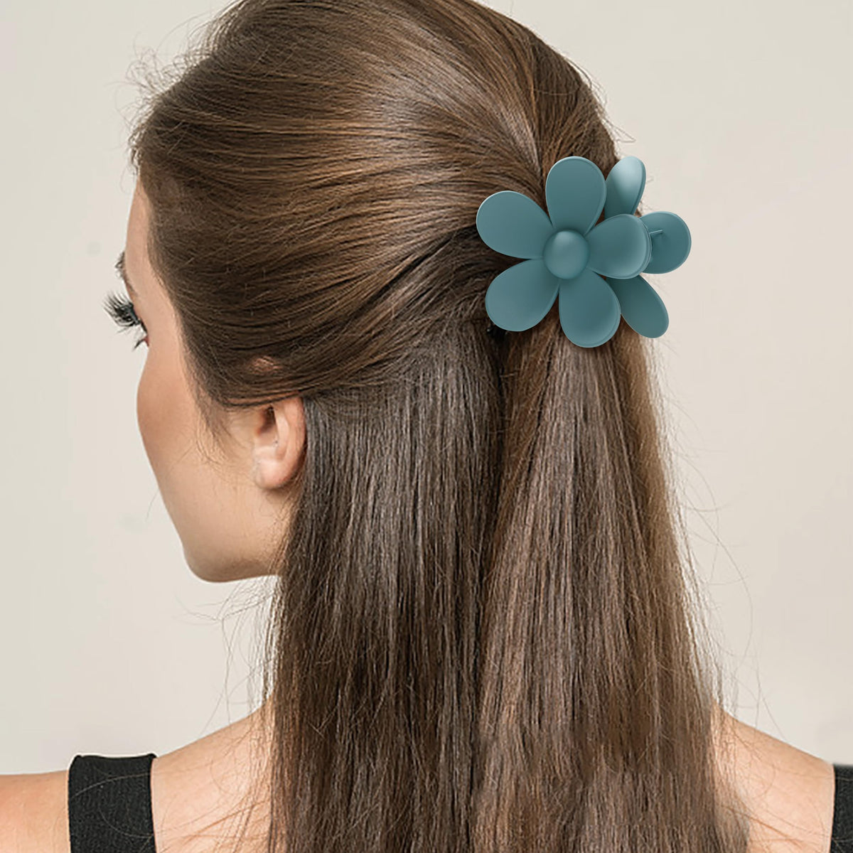 Sunolga clip holding thick hair in an easy updo during daily routine