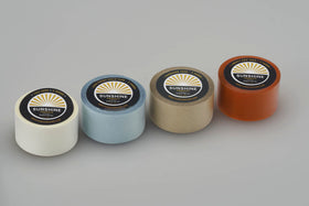 Sunshine Tape spool unrolled to show 1 inch width and length benefit