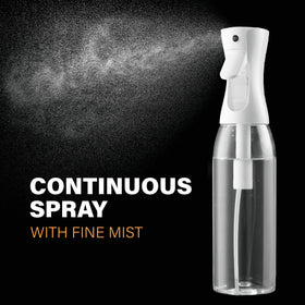 SUPER+ visible spray pattern of fine mist covering hair for even hydration
