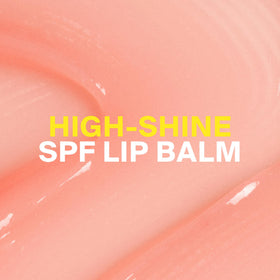Supergoop! Glow Gloss applied on lips showcasing sheer pink shine benefit