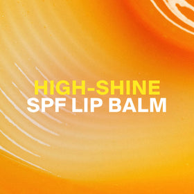 Supergoop! swatch on hand displaying sheer coral tint and hydration