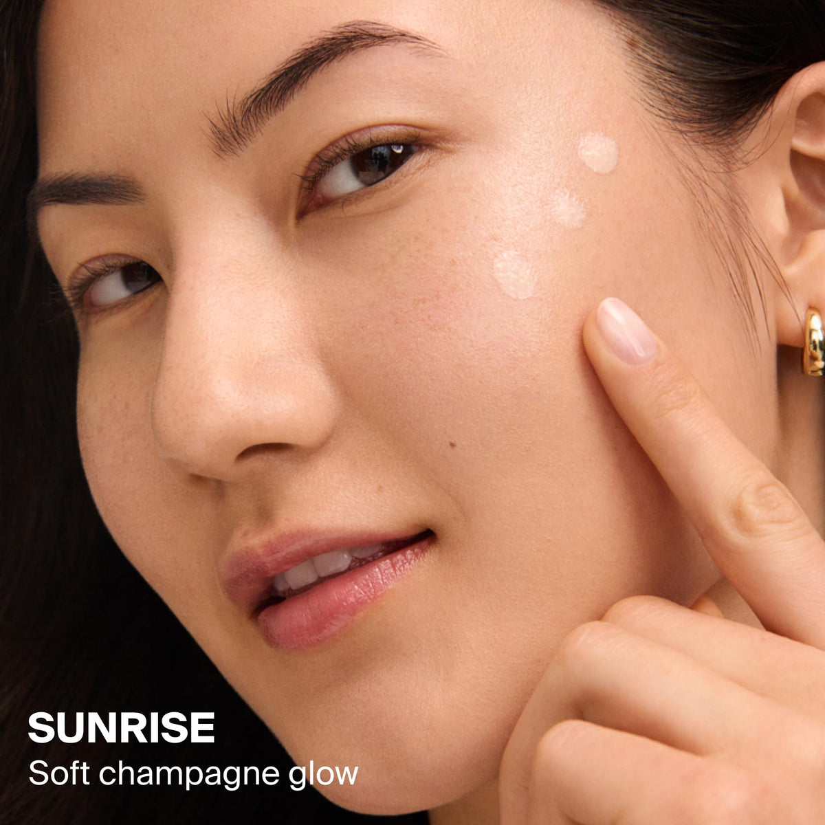 Supergoop! product texture on hand showing lightweight, blendable hydration benefit