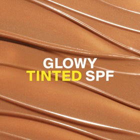Supergoop! close-up cream texture with dewy sheen demonstrating luminous finish