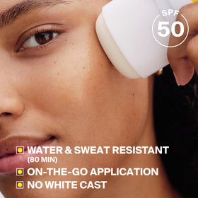 Supergoop! PLAY applying to nose demonstrates quick touch-up convenience