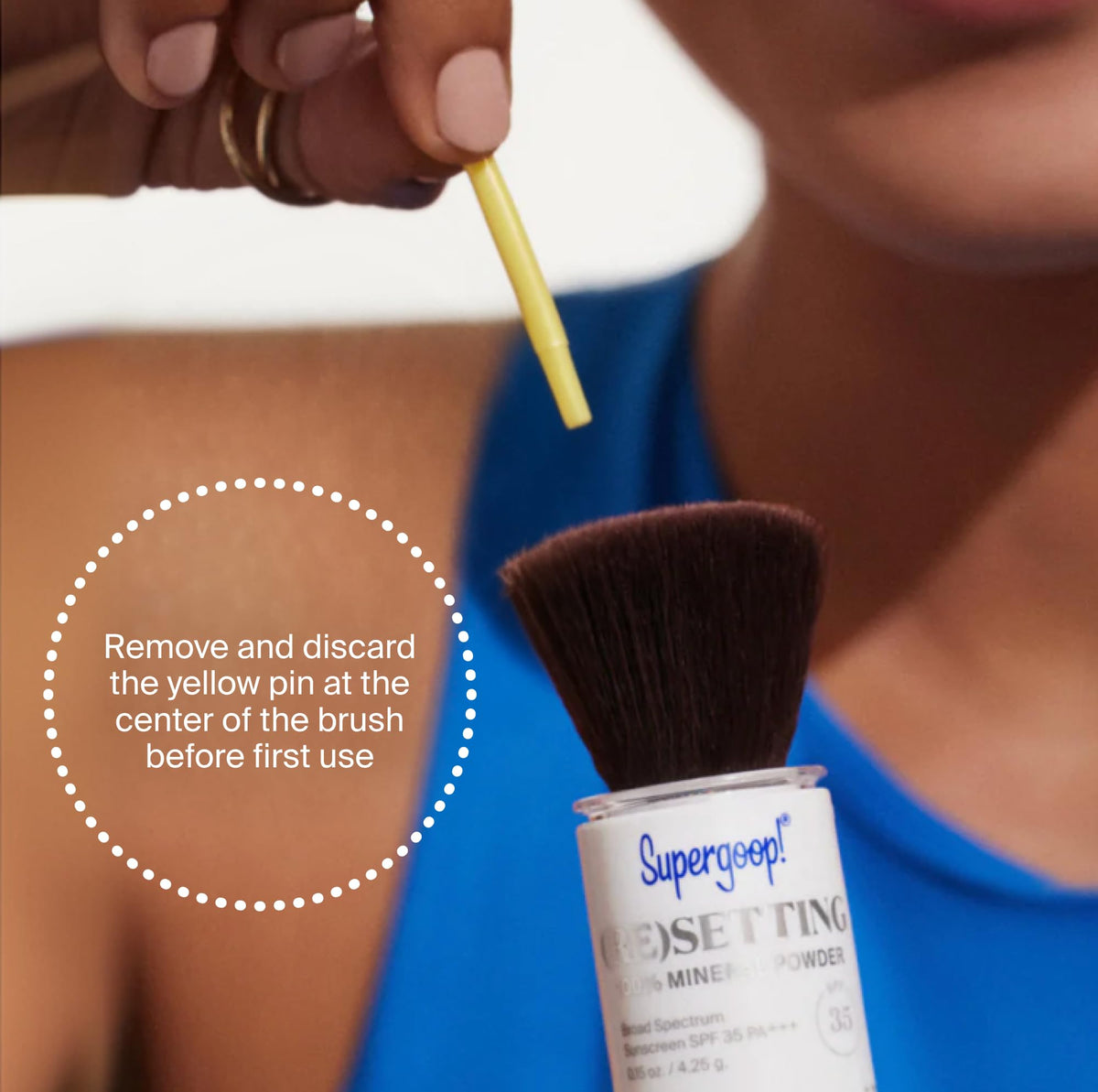 Supergoop! applying powder on model to set makeup and reduce shine