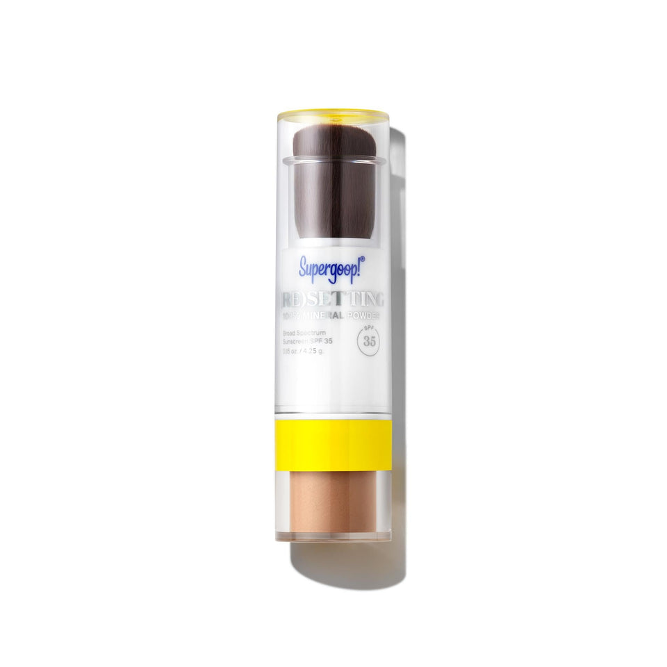 Supergoop! Deep front packaging showing compact and brush, travel-friendly protection