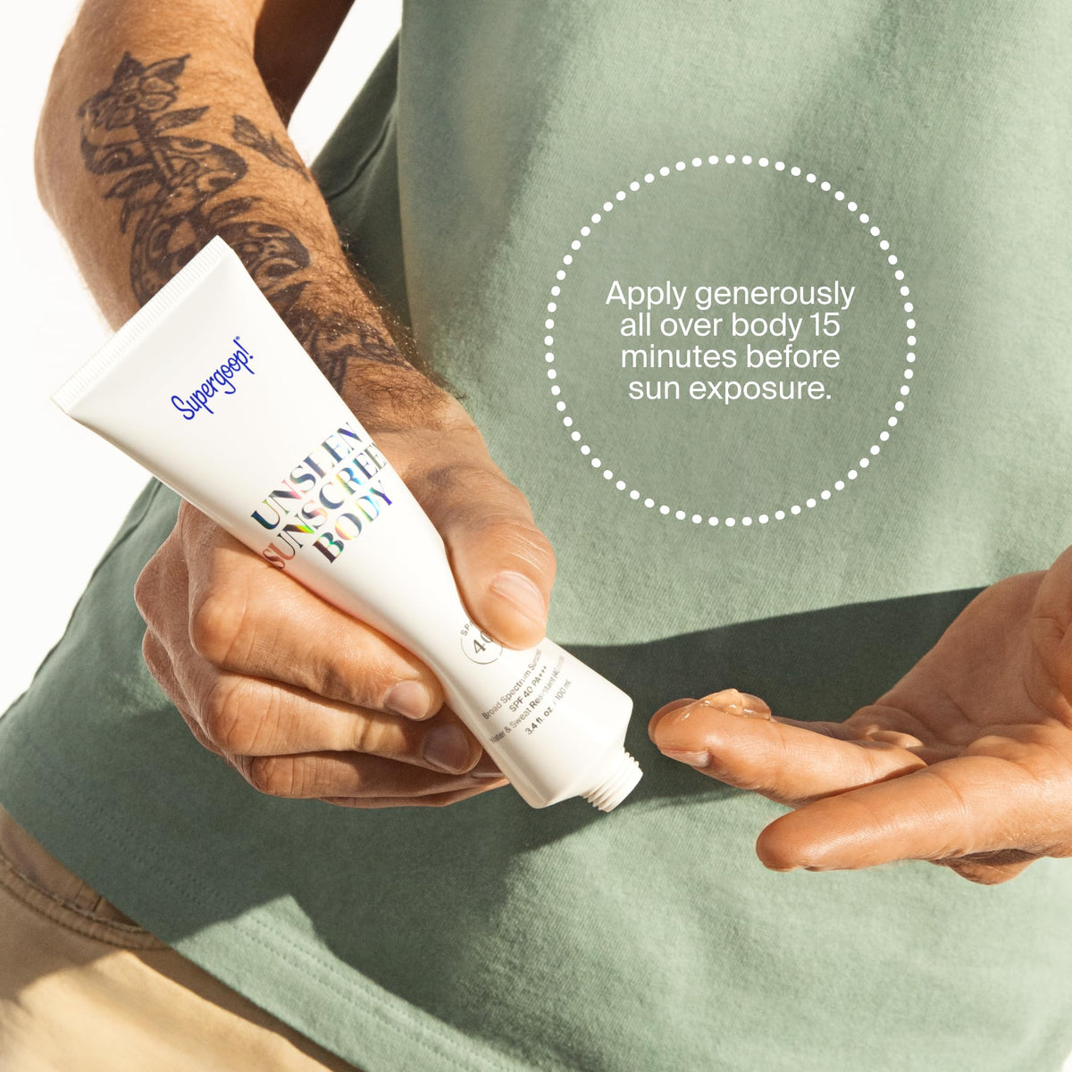Supergoop! bottle staged on a sunny beach towel for outdoor protection