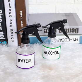 SUPERLELE hand holding bottle to show 8oz scale and portable convenience