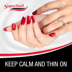 SuperNail close-up pour of thinner into polish showing easy viscosity control benefit