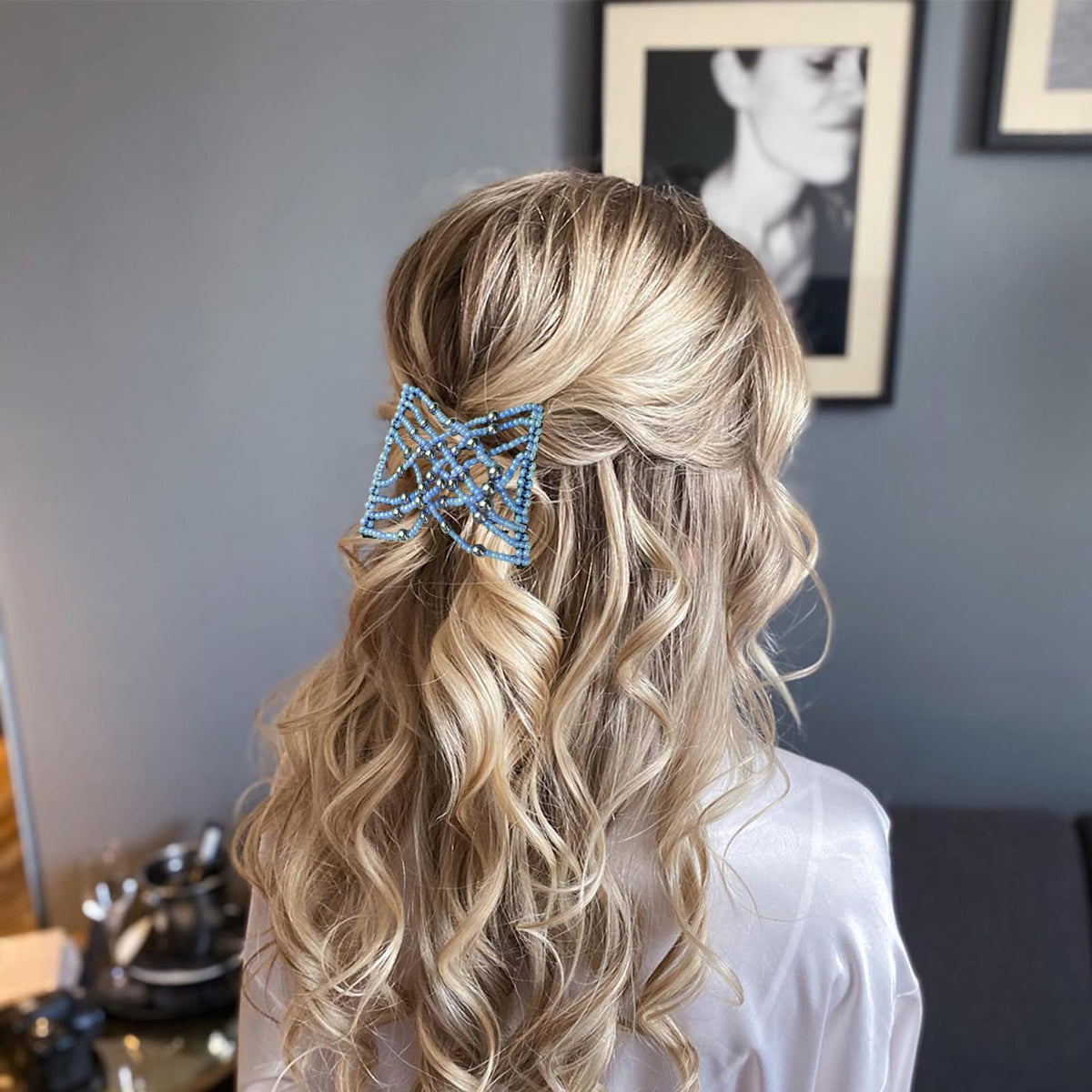 Suptizizkz used to create a neat bun on thick curly hair for secure hold