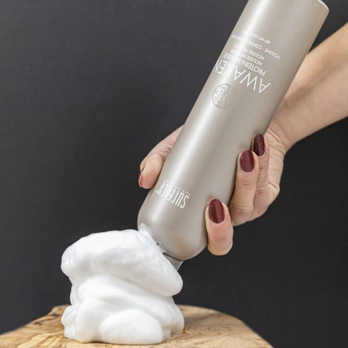 Surface Awaken Mousse on bathroom counter in lifestyle scene for daily use
