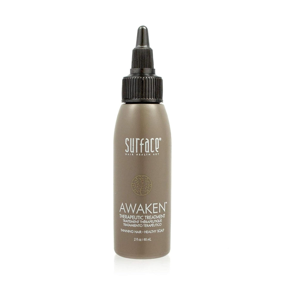 SURFACE Awaken bottle front view showing compact 2 fl oz and benefits