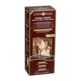 Surya Brasil henna applied to hair strand by hand for even coverage