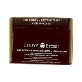 Surya Brasil tube shown next to hand to illustrate 70 ml travel size