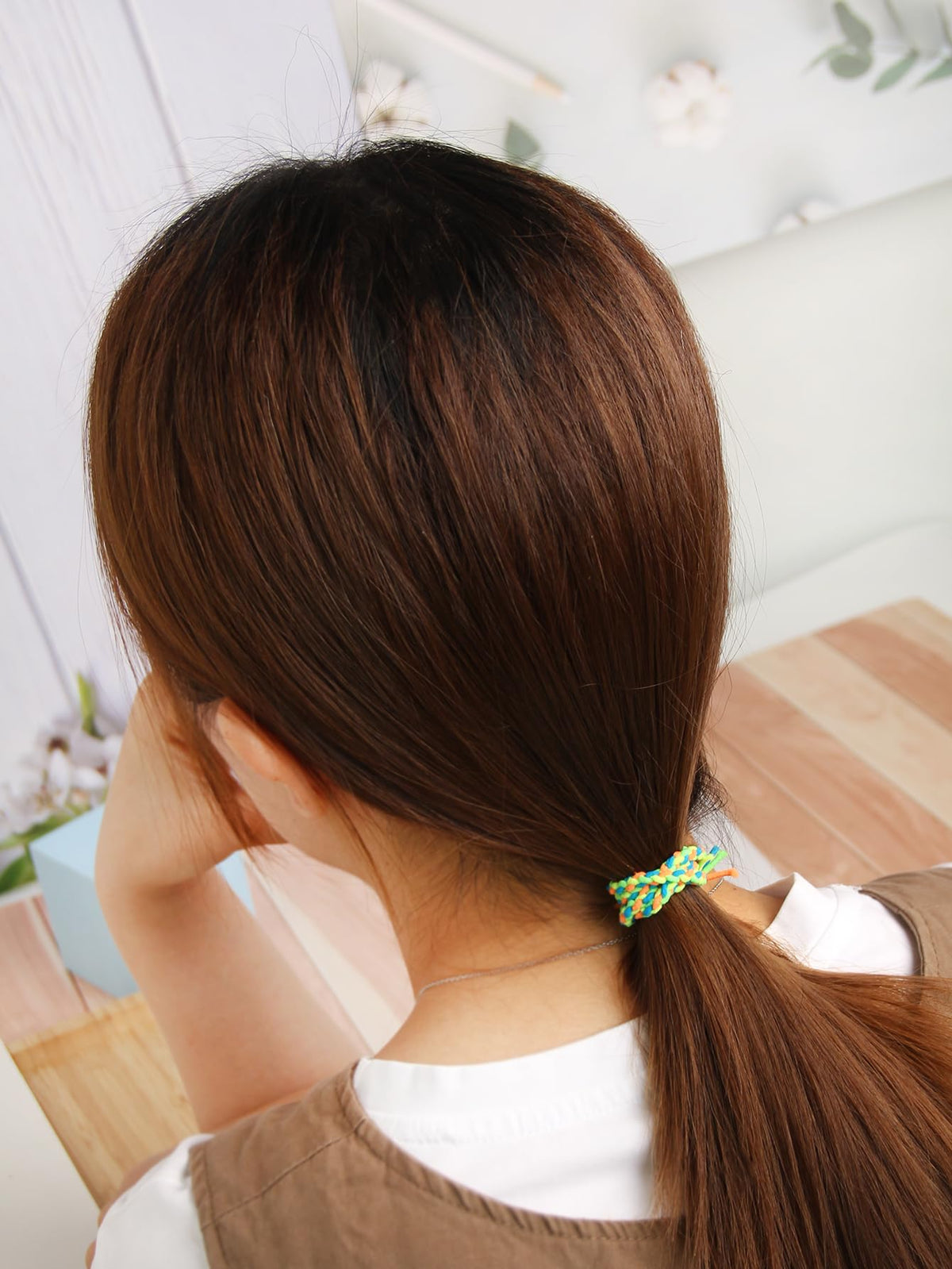 SUSULU hair tie worn on wrist as bracelet for quick access