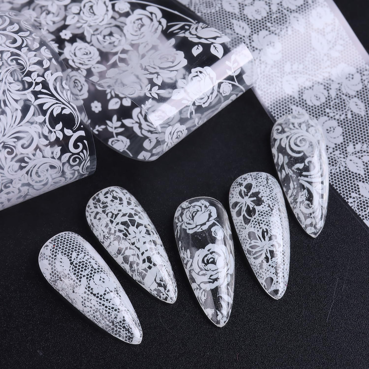 SUTOKAKA white floral foil on tip demonstrating delicate, vintage-style nail art