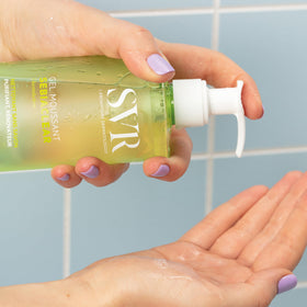 SVR Sebiaclear dispensing foam on hand to demonstrate gentle lather