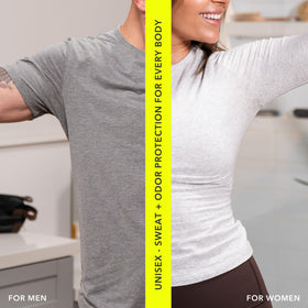 Man and woman smiling outdoors illustrating SweatBlock confidence and daily comfort