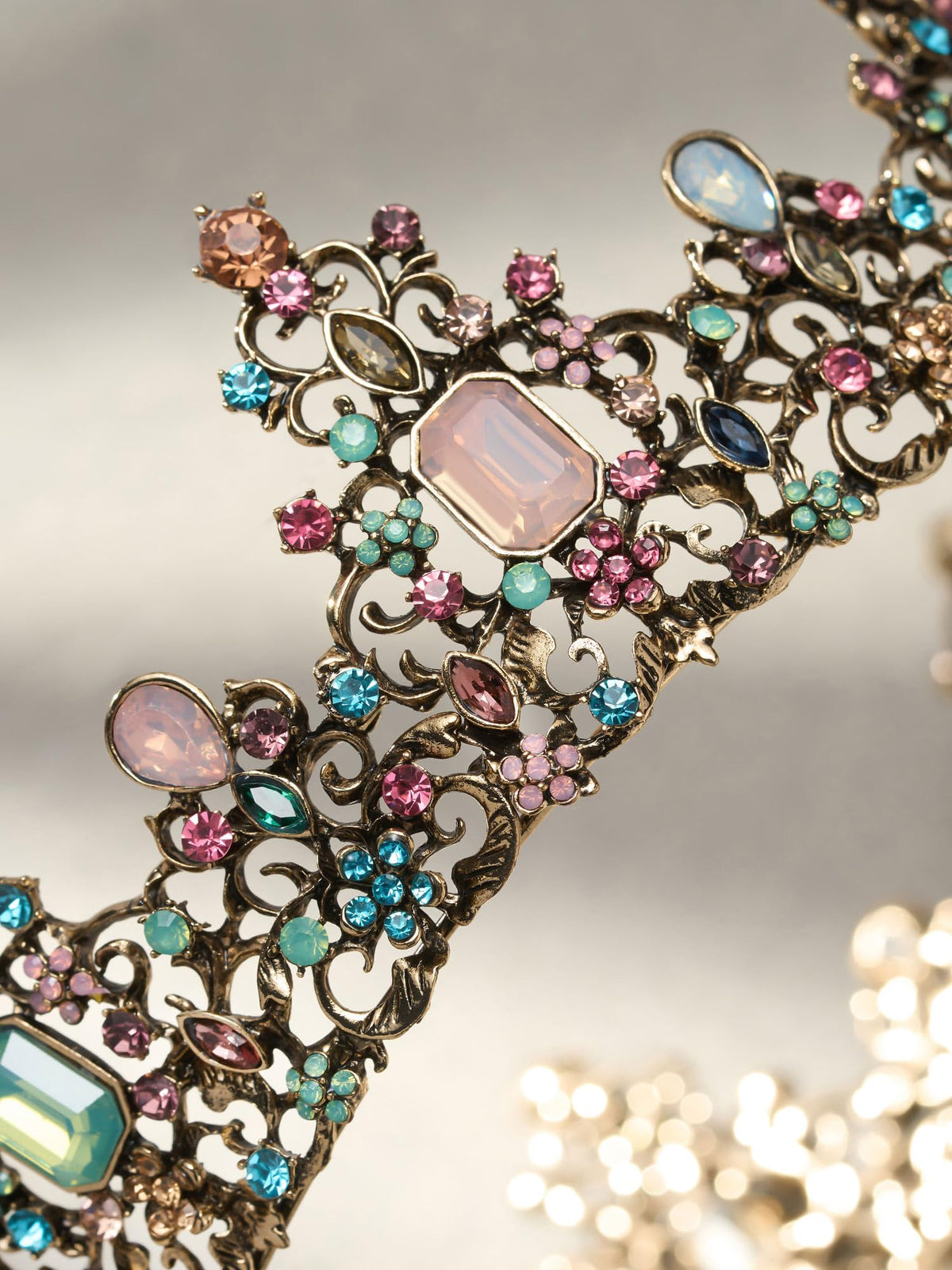 SWEETV crown detail of gold-plated alloy emphasizing durable finish and warm tone