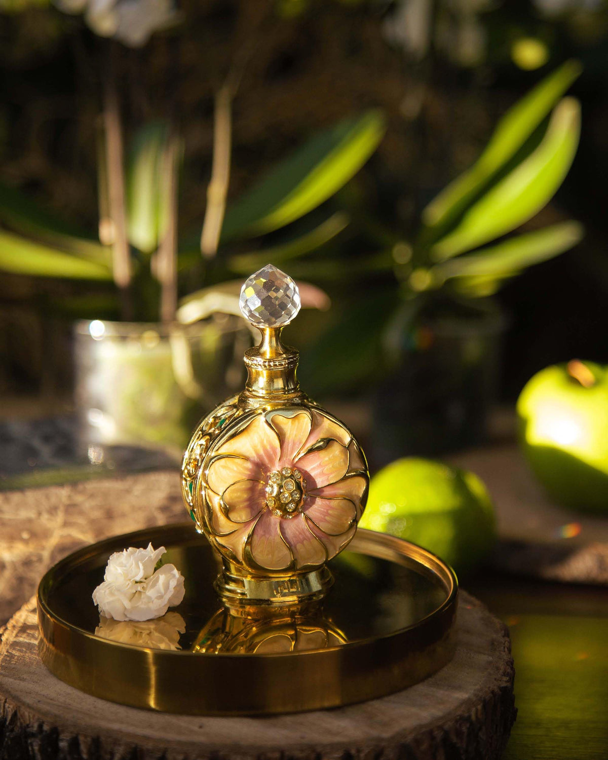 Swiss Arabian Amaali oil drop on skin texture showing rich, long-lasting concentration