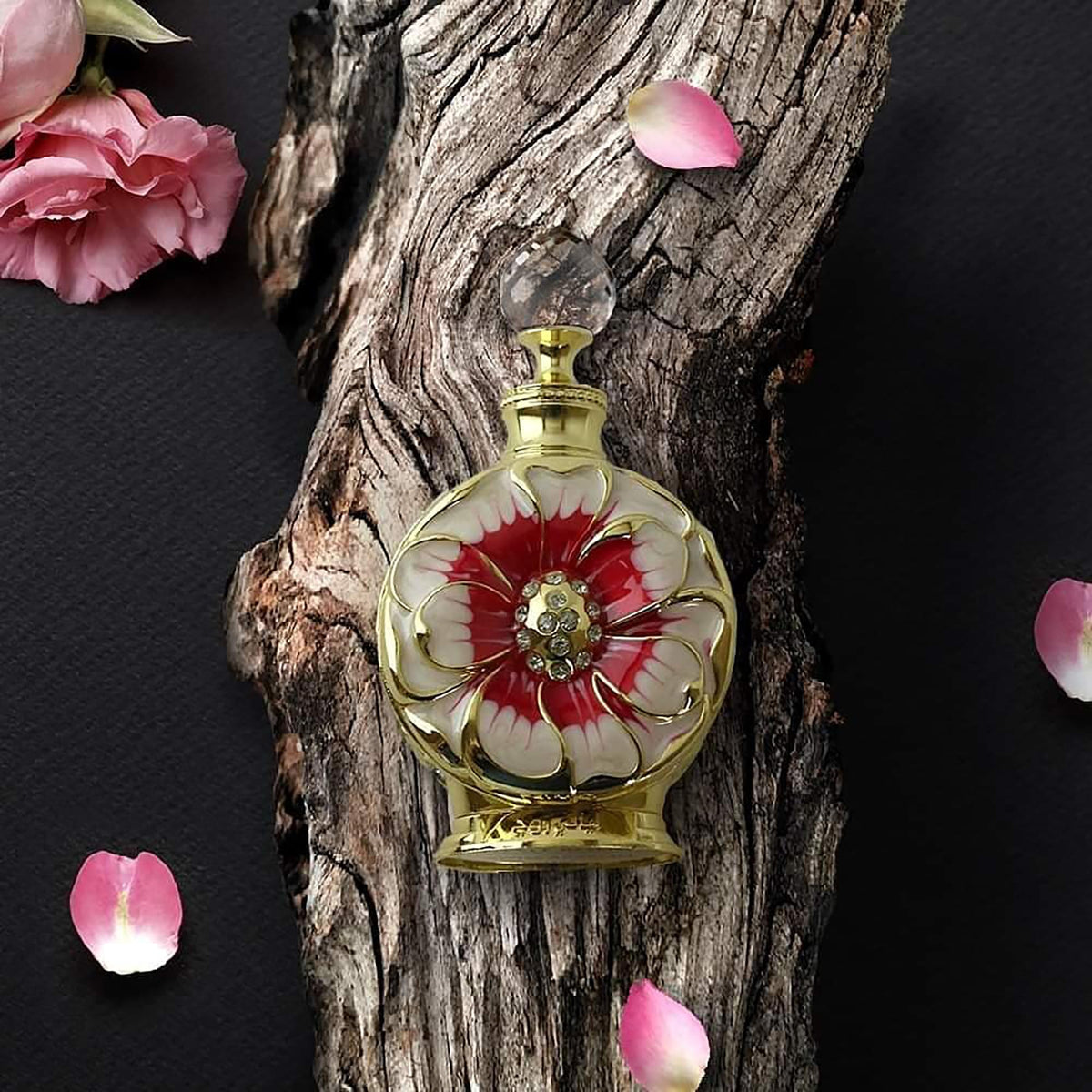 Applying Swiss Arabian perfume oil to pulse point for long-lasting scent