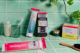 Swisspers pads styled in bathroom to show everyday routine convenience and storage benefit