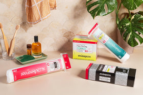 Swisspers stacked pads lifestyle shot highlighting bulk convenience benefit
