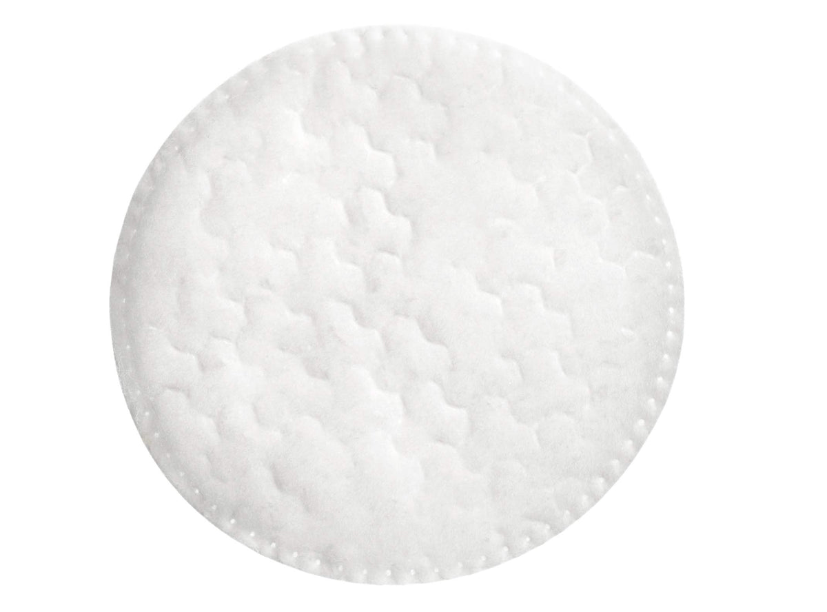 Swisspers pad next to toner bottle for easy application and refreshed skin