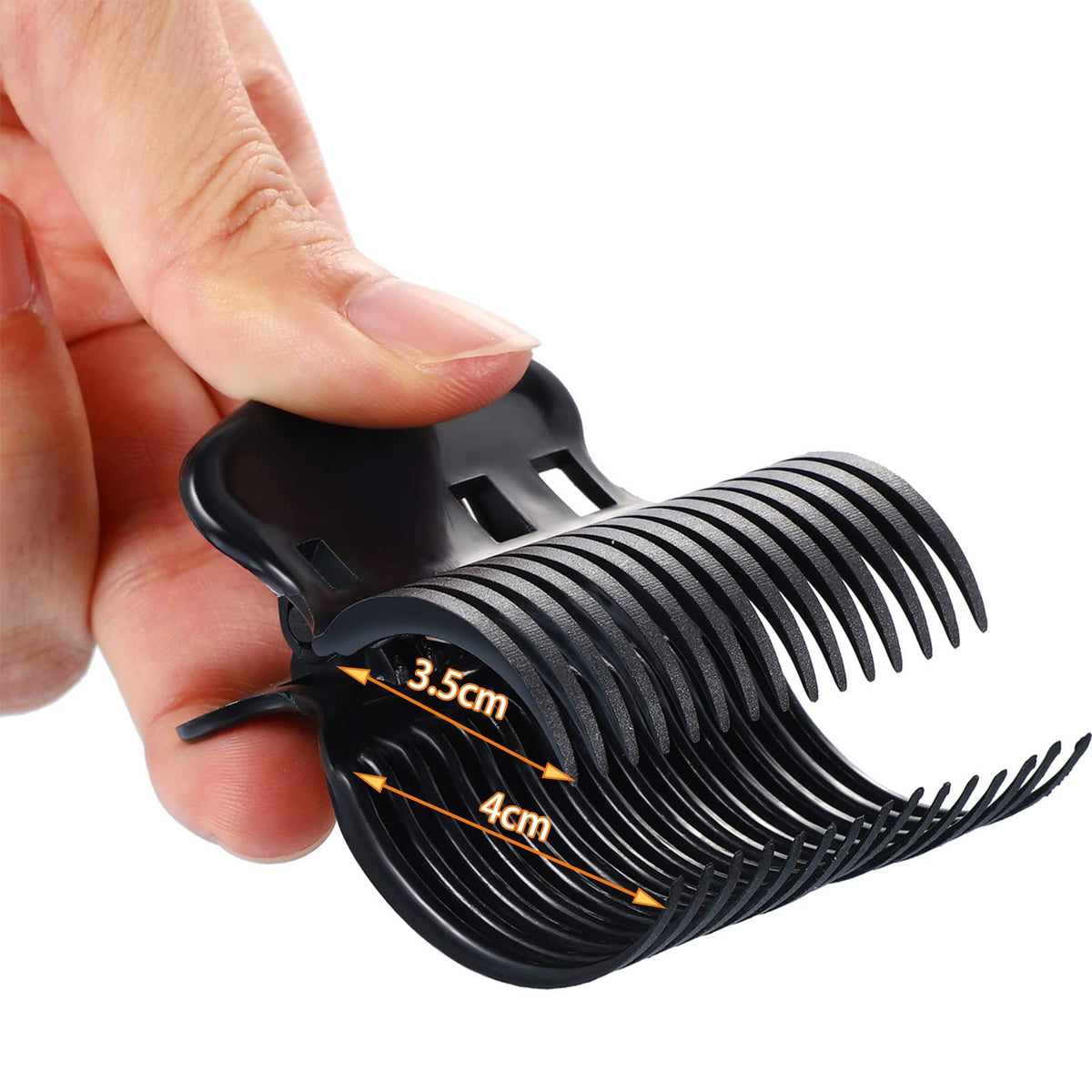 Syhood clip held in hand for scale, illustrating portable size and easy sectioning benefit