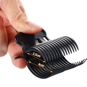 Syhood clip held in hand for scale, illustrating portable size and easy sectioning benefit