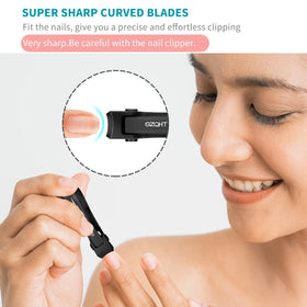 SZQHT clippers beside a coin to show compact size and travel convenience