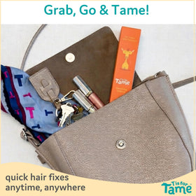 T is for Tame inside a purse for quick on-the-go touch-ups