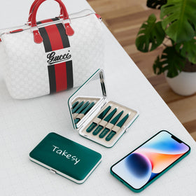 Takesy travel case inside purse illustrating convenience for on-the-go touch-ups