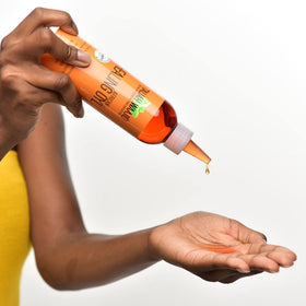Taliah Waajid applied to skin on forearm demonstrating hydration benefit