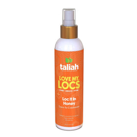 Taliah Waajid 8oz bottle held in hand showing size and travel-friendly benefit