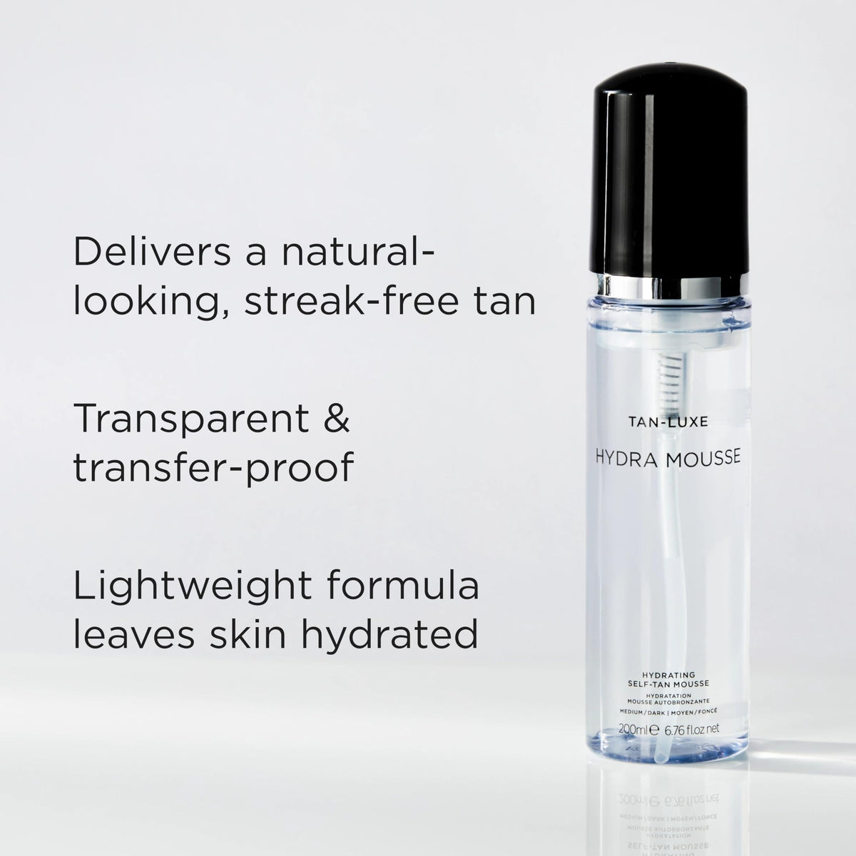 Tan-Luxe Hydra Mousse being applied to an arm for even, streak-free coverage